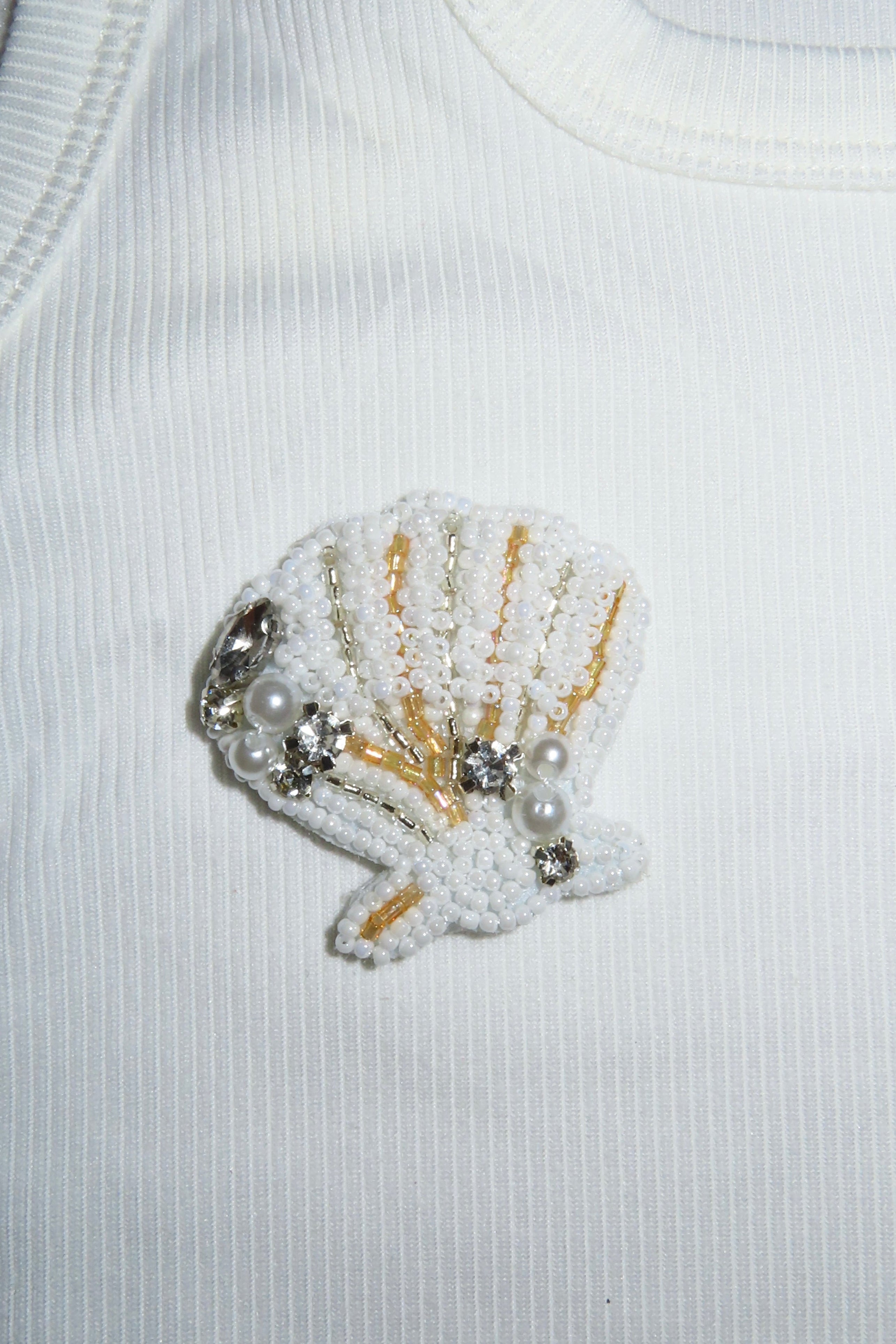 White and gold shell patch