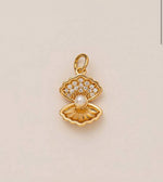 Gold shell charm
