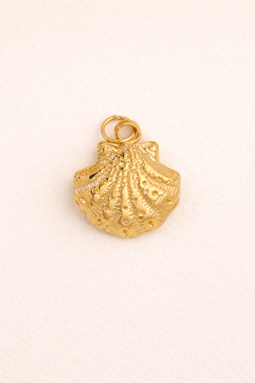 Gold shell charm