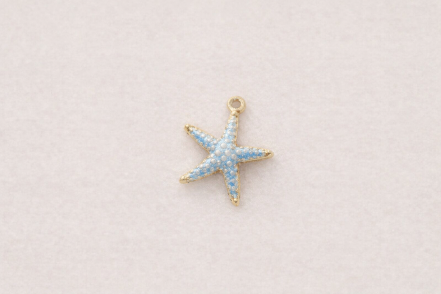 Blue starfish charm