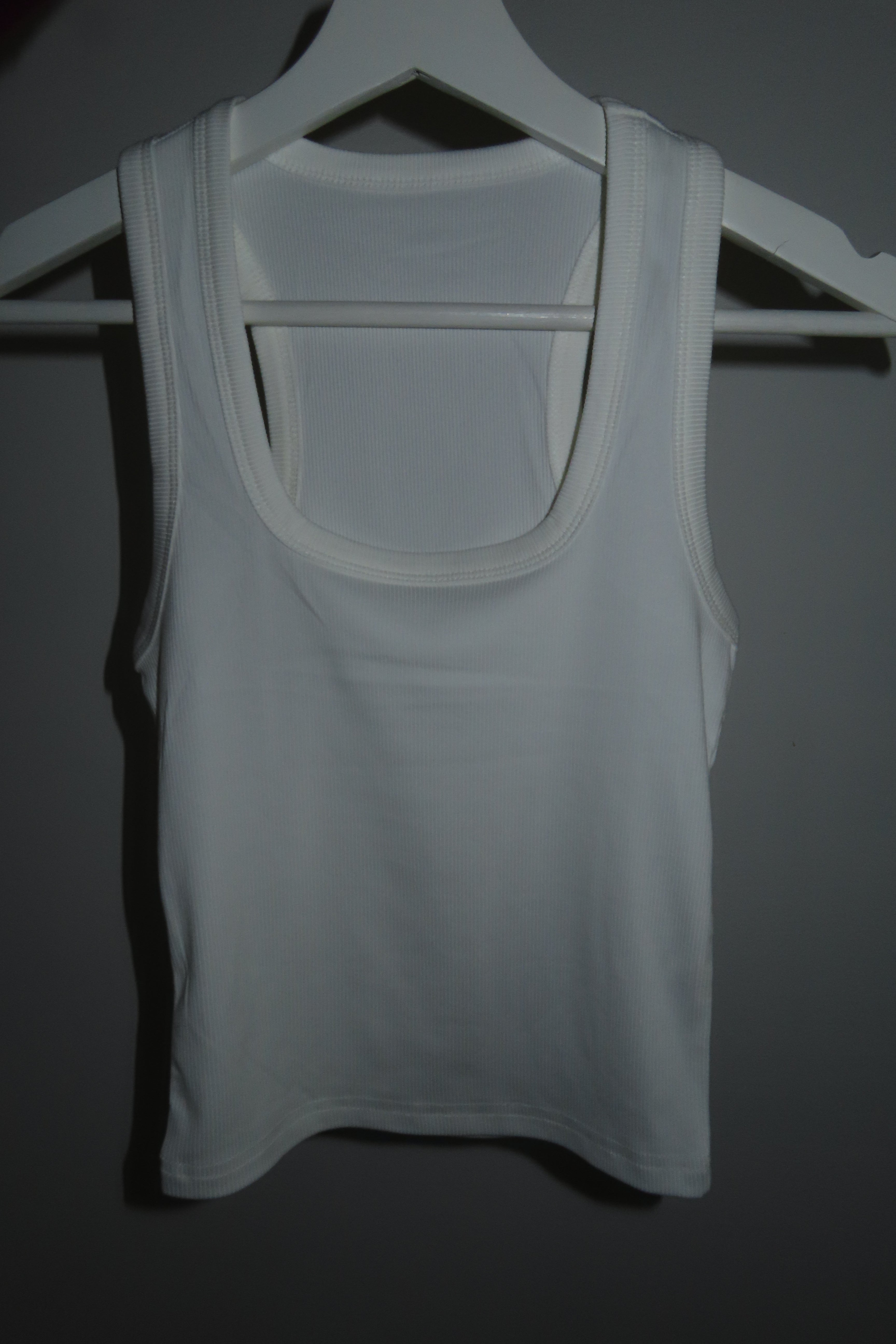 White vest top